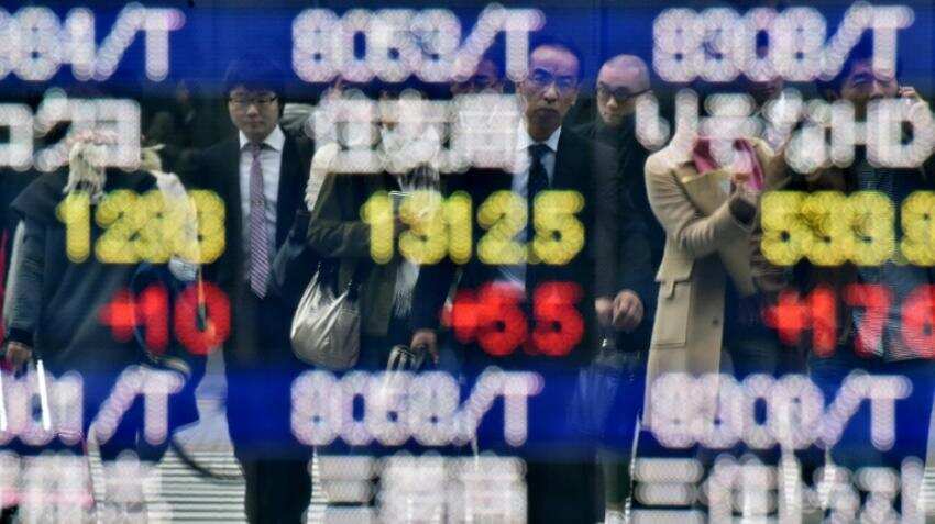 Oil prices fall further in Asia, yen gains hit Tokyo