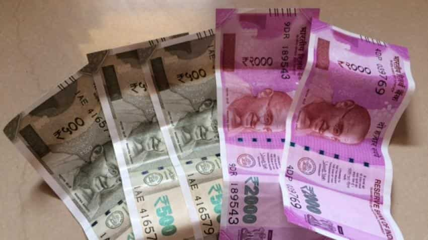 Rupee weakens by 11 paise against dollar in early trade