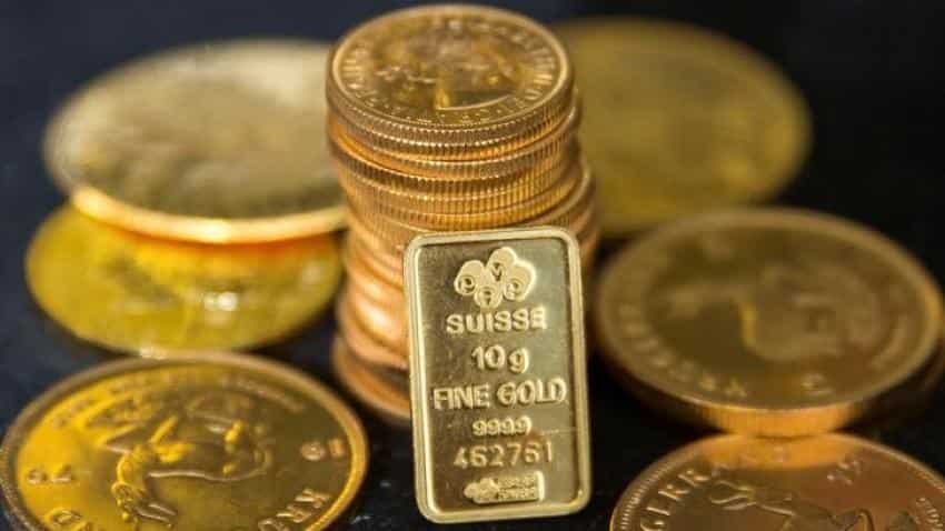 Gold rises from multi-month lows as US dollar weakens