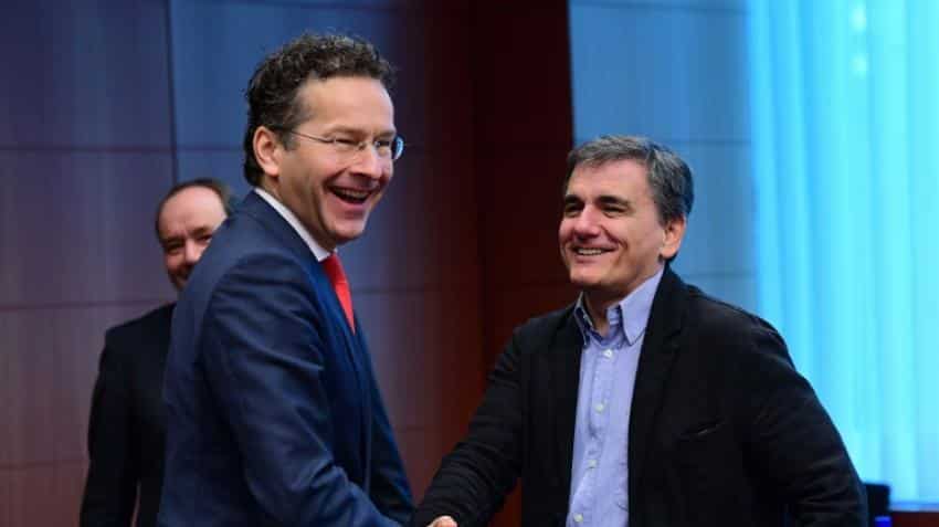 Eurozone agrees debt relief for Greece amid IMF row Eurozone agrees debt relief for Greece amid IMF row