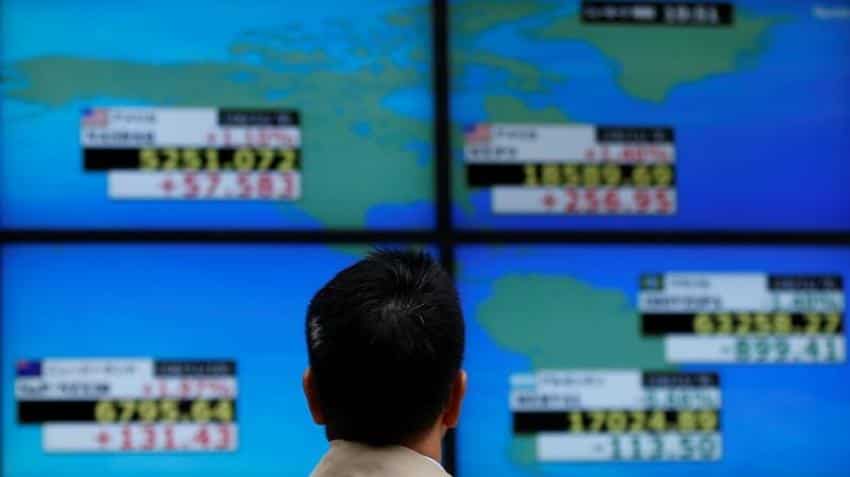 Asian shares edge up as markets look to ECB after Italian vote