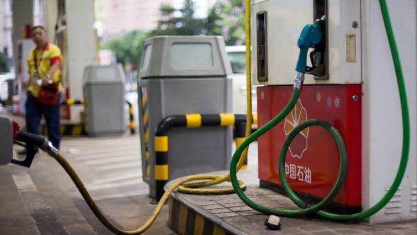 Asian energy firms rally with oil on output cut deal