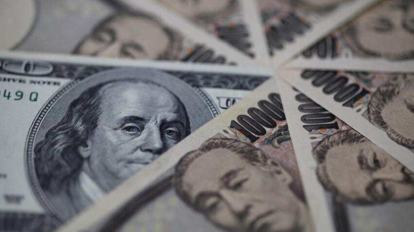 Dollar pulls away from 14-year peak as investors take profits