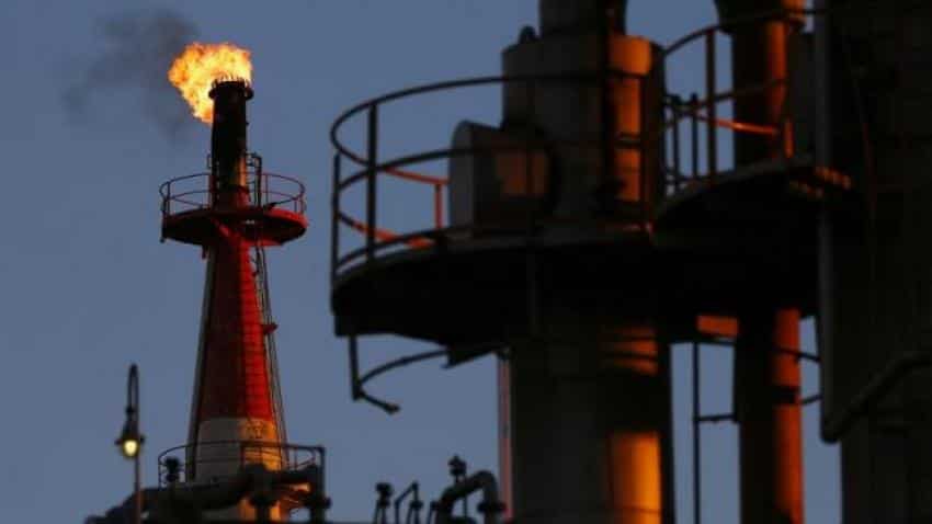 Oil prices up in quiet session as year-end approaches