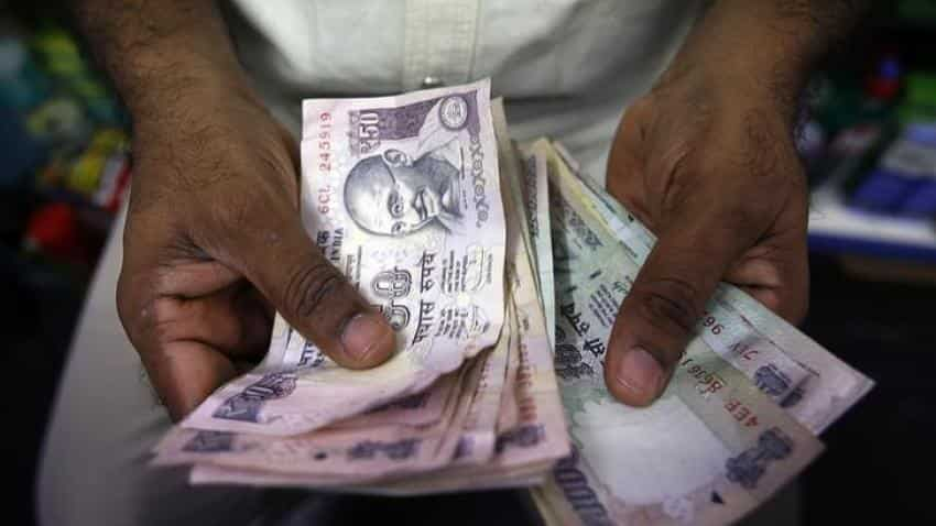 Rupee weakens by 15 paise against dollar in early trade 