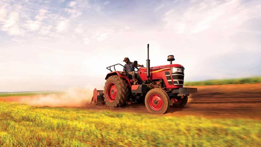 Mahindra &amp; Mahindra restructures business in three verticals, shares rise