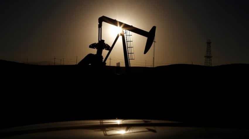 Oil prices edge up despite unexpected U.S. crude inventory build