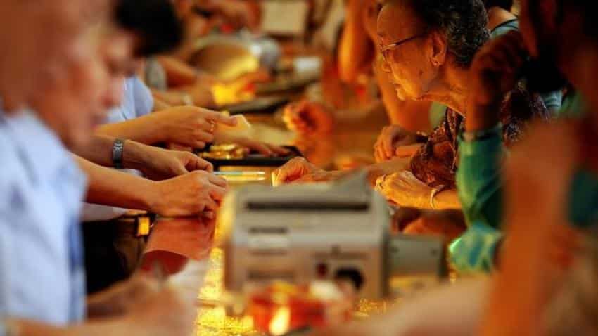 Indian jewellers stock up for weddings; rising prices cap demand elsewhere
