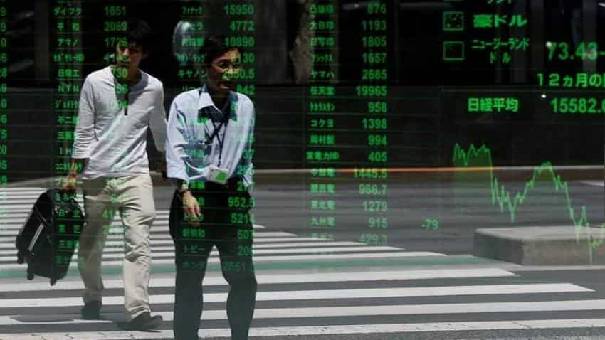 Asian stocks and dollar firmer as Yellen hints at March rate hike