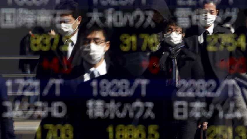 Asian shares off 1 1/2-year high, Trump&#039;s yuan comment in focus
