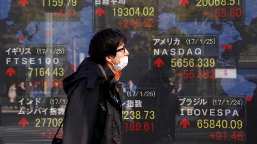 Asian stocks pull back on fresh doubts about Trump policies