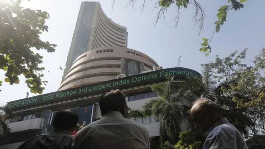 Market review: Equities trim gains on global cues, profit booking
