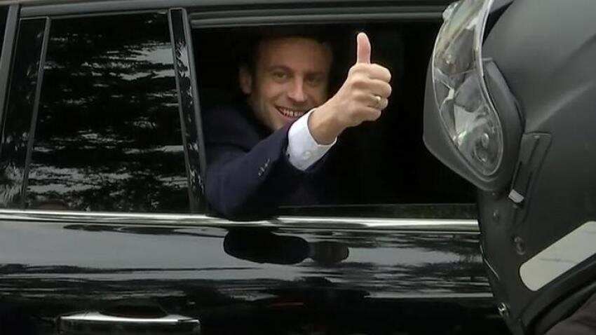 Emmanuel Macron takes step towards French presidency with win in first round of voting