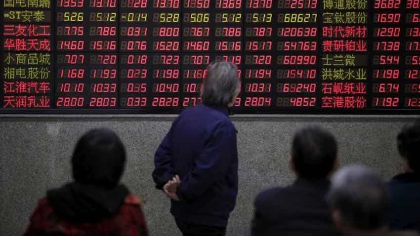 Asian stocks tread water on US, commodities concerns
