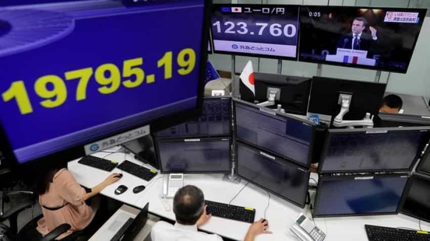 Asia stocks mixed, but Trump&#039;s troubles weigh
