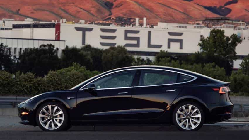 Tesla provides first look at cheaper Model 3 sedan