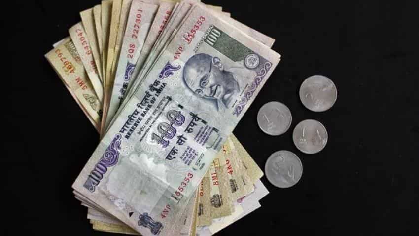 Funds inflows lift rupee to 63.60 against dollar