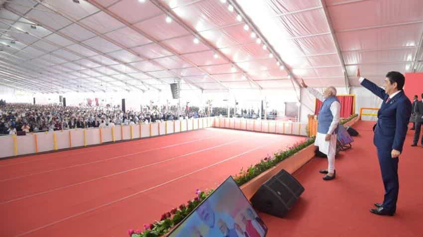 Modi-Abe lay foundation stone for bullet train; advance deadline by a year Modi-Abe lay foundation stone for bullet train; advance deadline by a year