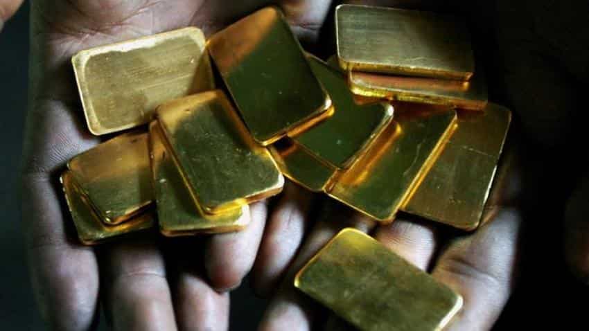 Gold price firms on softer dollar but narrow range holds