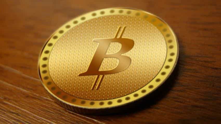 Bitcoin plummets more than 12 percent to below $15,000