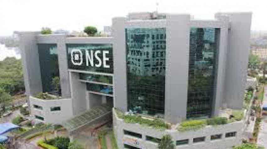 Sensex hits record; auto stocks rise