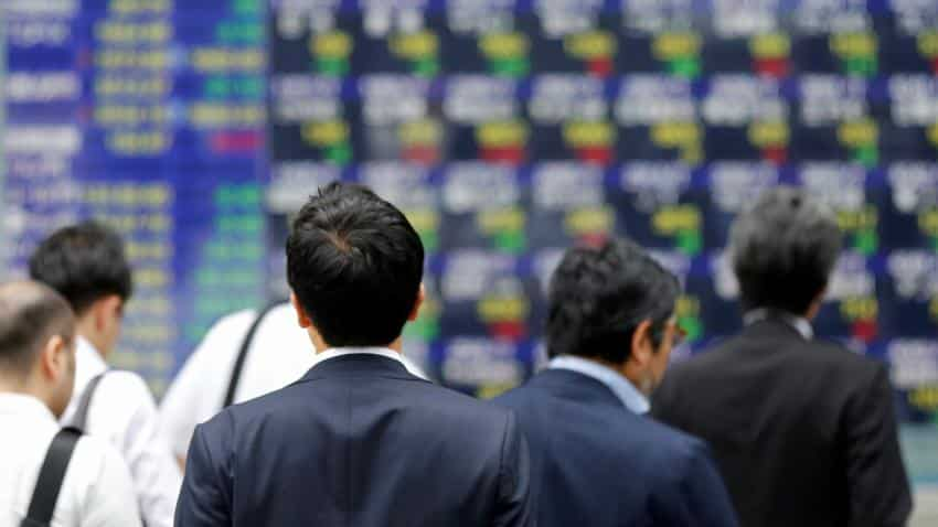 Asia stocks subdued as US tax cuts belt bonds