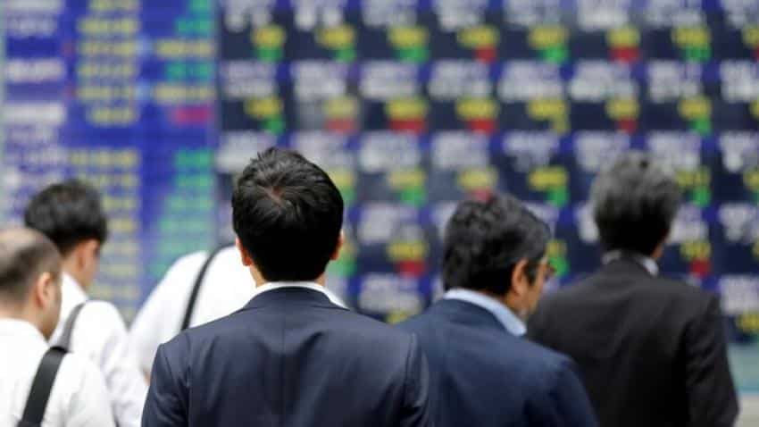 Asia stocks advance toward historic highs, US earnings test
