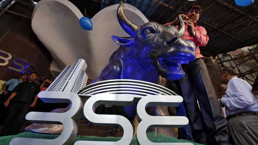 Markets pare gains, but clock closing highs; Nifty holds above 10,800
