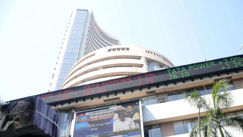 Sensex trades flat, Nifty holds above 10,800; YES Bank top gainer