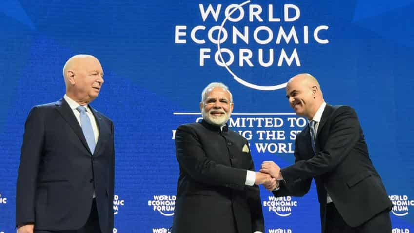Modi hits out at protectionism; says terrorism, climate change Modi hits out at protectionism; says terrorism, climate change