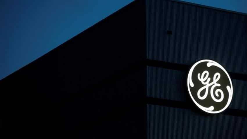 GE posts $10 billion loss, sales drop as power weakens