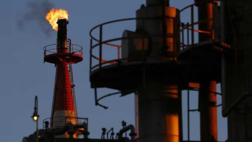 Oil hits $71 for first time since 2014 on tighter supply and weak dollar