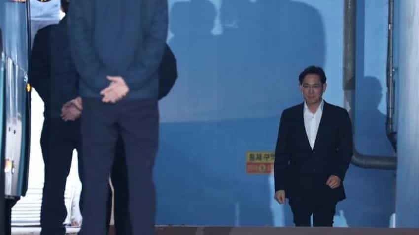 Samsung scion Lee walks free after jail term suspended, faces leadership challenges