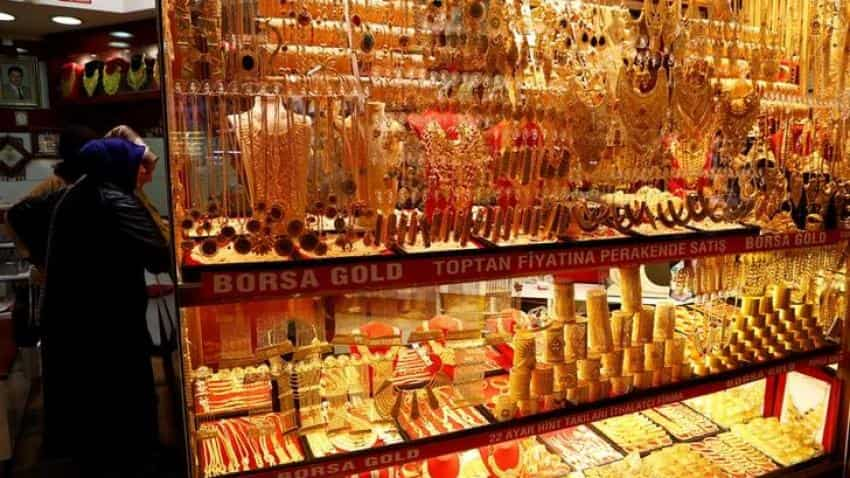 Gold slips marginally to Rs 30,433; track city-wise prices here 