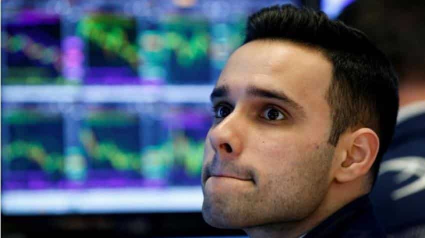 Investors spooked on trade war fears, cut stock exposure to four-month low