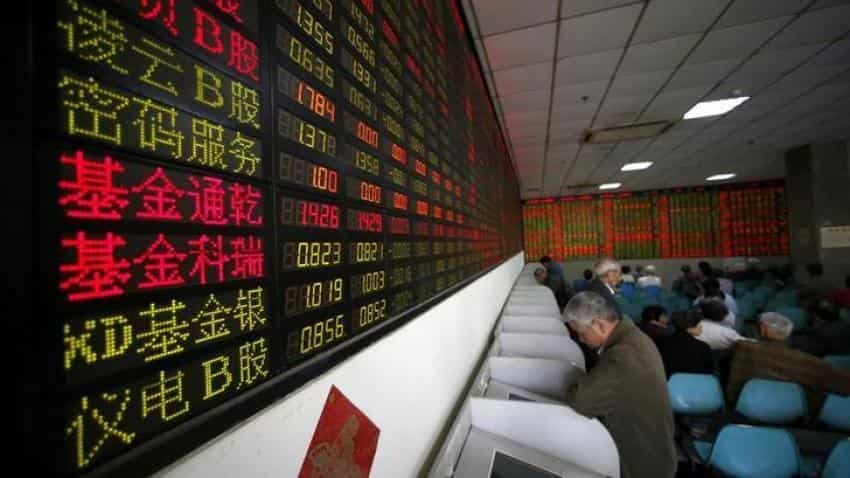 Asian markets mixed, oil prices slip amid Syria fallout