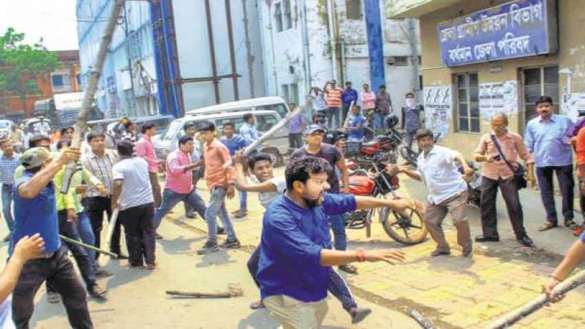 West Bengal panchayat election 2018: Violence hits state; Trinamool, BJP trade charges West Bengal panchayat election 2018: Violence hits state; Trinamool, BJP trade charges