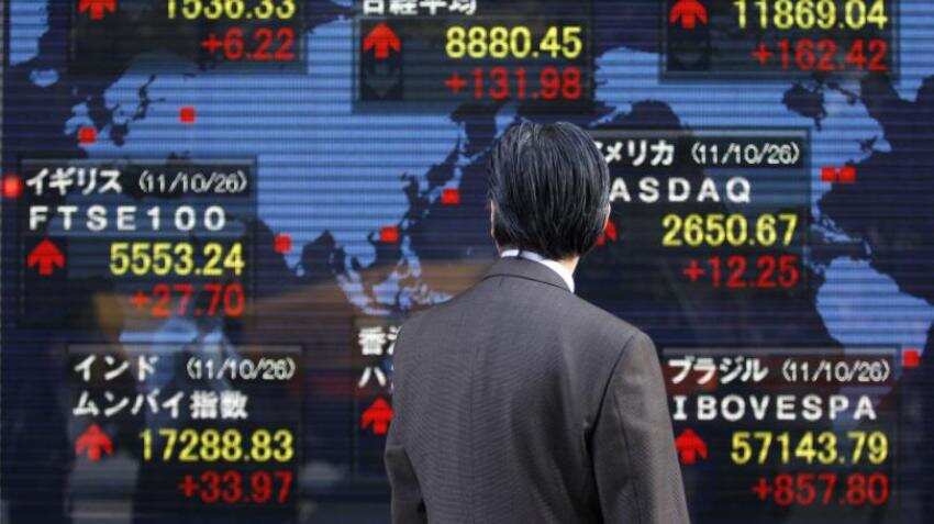 Asian markets fall on Italian turmoil; euro, oil at multi-week lows