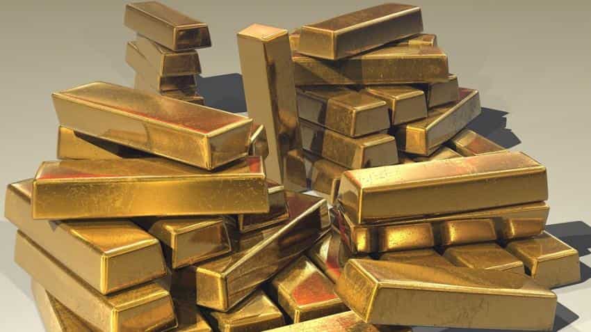 Gold zooms Rs 330 on firm global cues, silver regains Rs 42k-mark Gold zooms Rs 330 on firm global cues, silver regains Rs 42k-mark