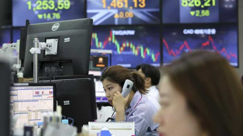 Asian markets fall as Sino-US trade spat intensifies