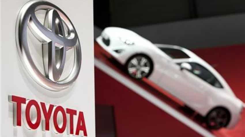 Toyota, pressed to innovate, is cutting marketing costs to fuel research