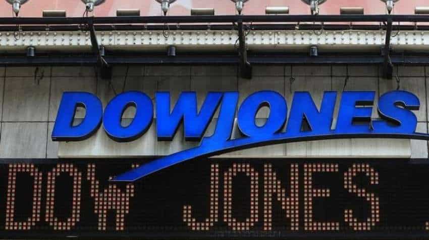 Dow set to snap eight-day losing run as oil climbs