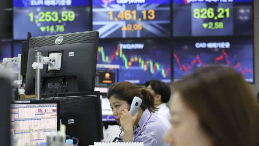 Asian markets stay near 9-month lows as trade frictions weigh