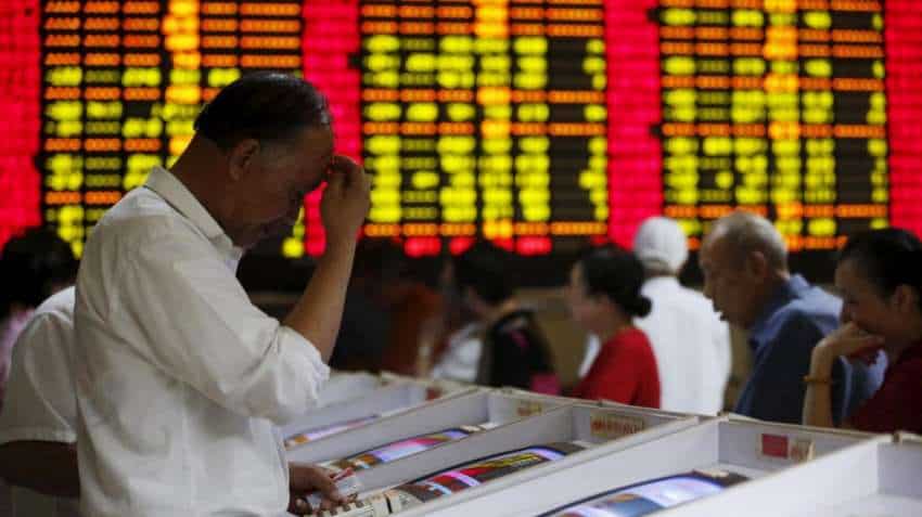 China seeks to soothe markets as trade angst rattles stocks, yuan