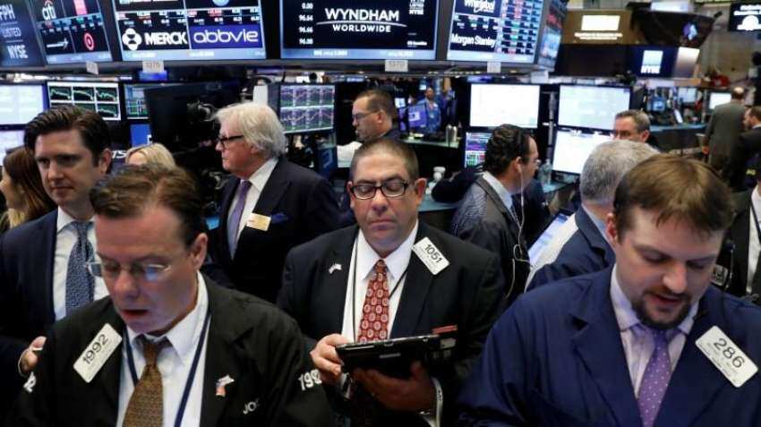 Dips in Facebook and Apple shares leave Wall Street lower