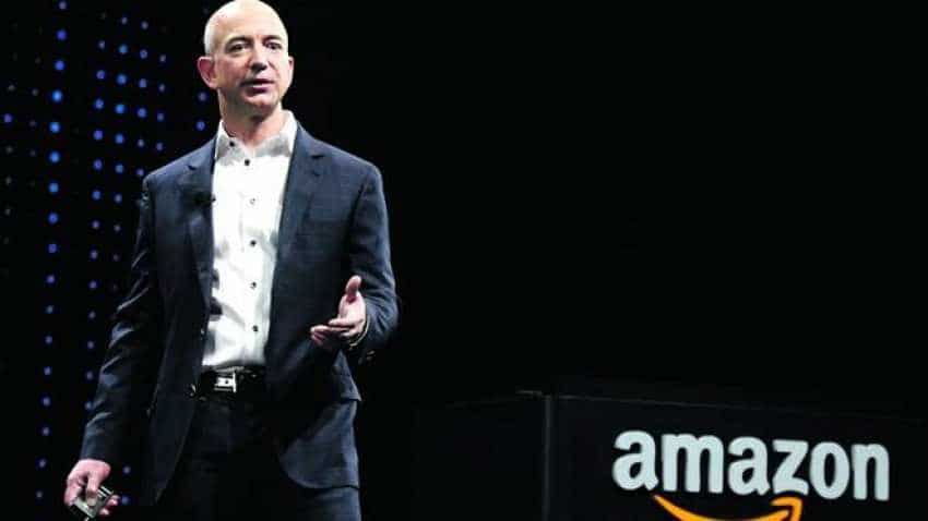 Amazon.com&#039;s stock market value hits $900 billion, threatens Apple 