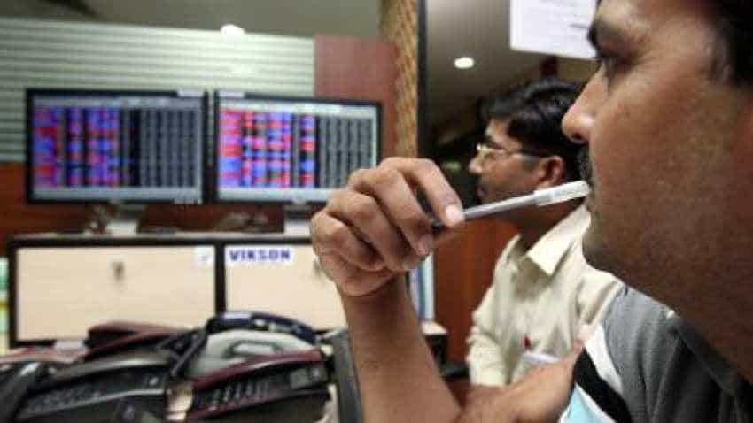 Sensex pares gains to slip in red, Nifty ends below 11,000; Kotak Mahindra Bank falls most