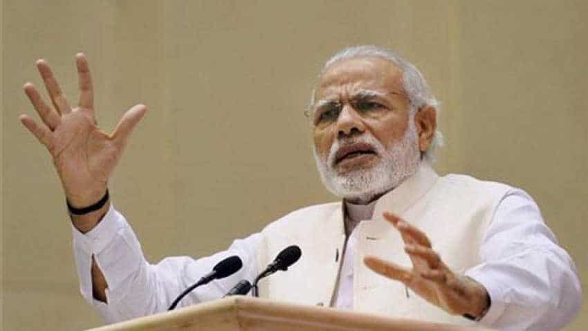 PM Narendra Modi says not afraid of being seen with industrialists, opposition hits back PM Narendra Modi says not afraid of being seen with industrialists, opposition hits back