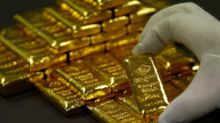 Gold price eases on firm dollar ahead of central bank meetings