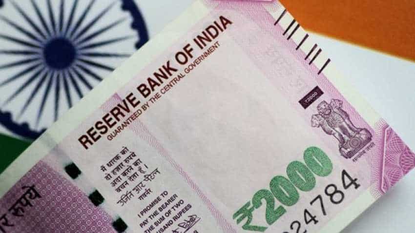 Rupee sinks to new low of 70.52, slumps 42 paise against US dollar Rupee sinks to new low of 70.52, slumps 42 paise against US dollar